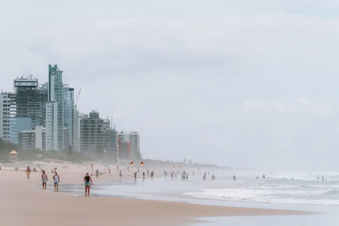 A bustling day at Surfers Paradise with skyscrapers and sandy beach, Australia.