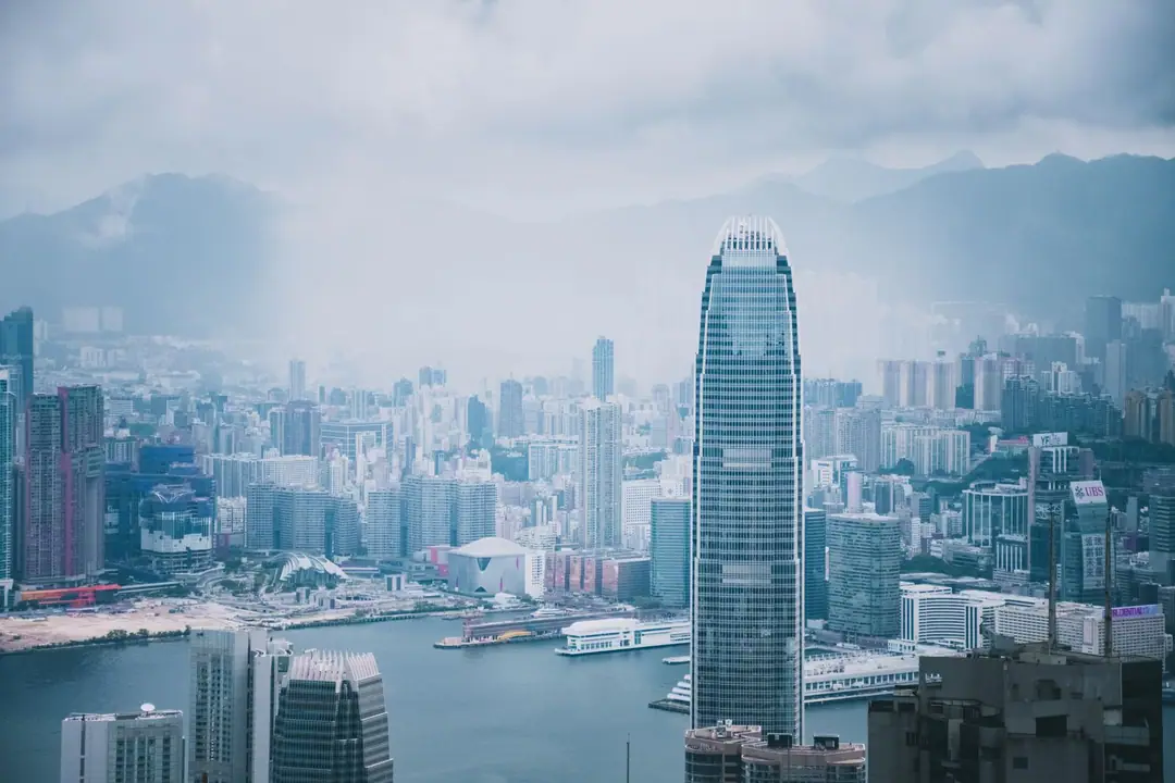 Panoramic view of Hong Kong's modern skyline featuring iconic skyscrapers and urban architecture.