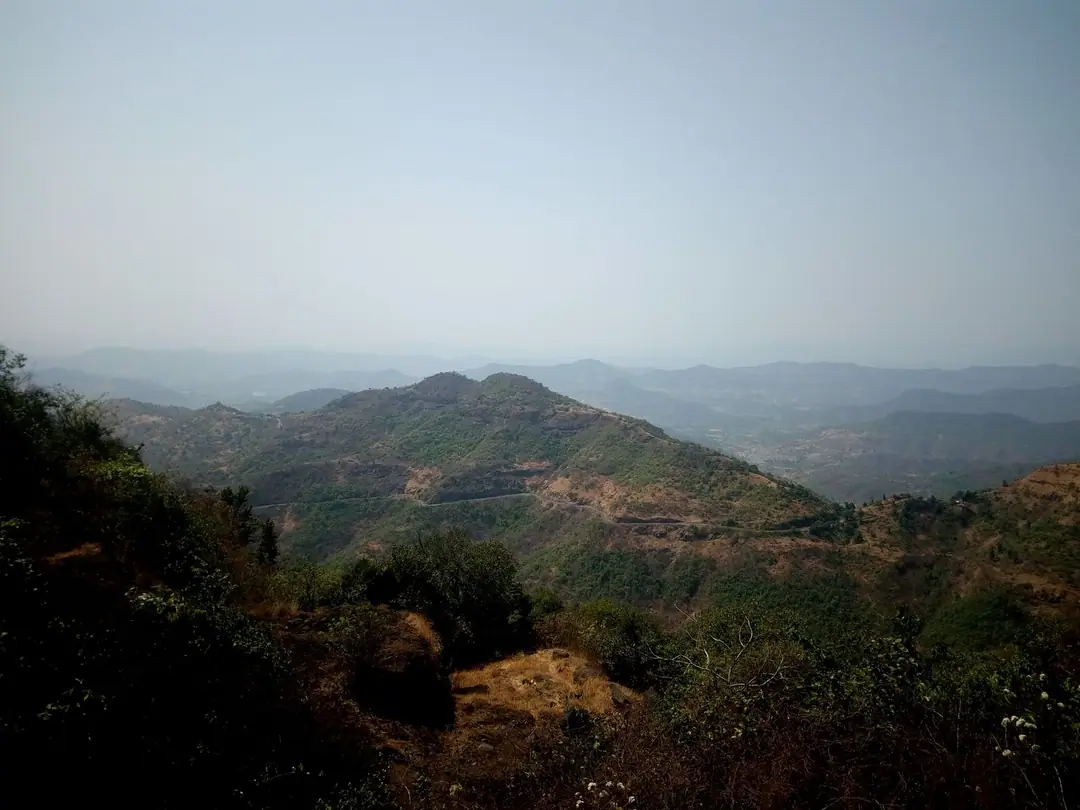 A breathtaking view of the lush hills in Mahabaleshwar, India under a clear sky.